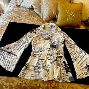 Long flared sleeve blouse with wrap around tie for front or back